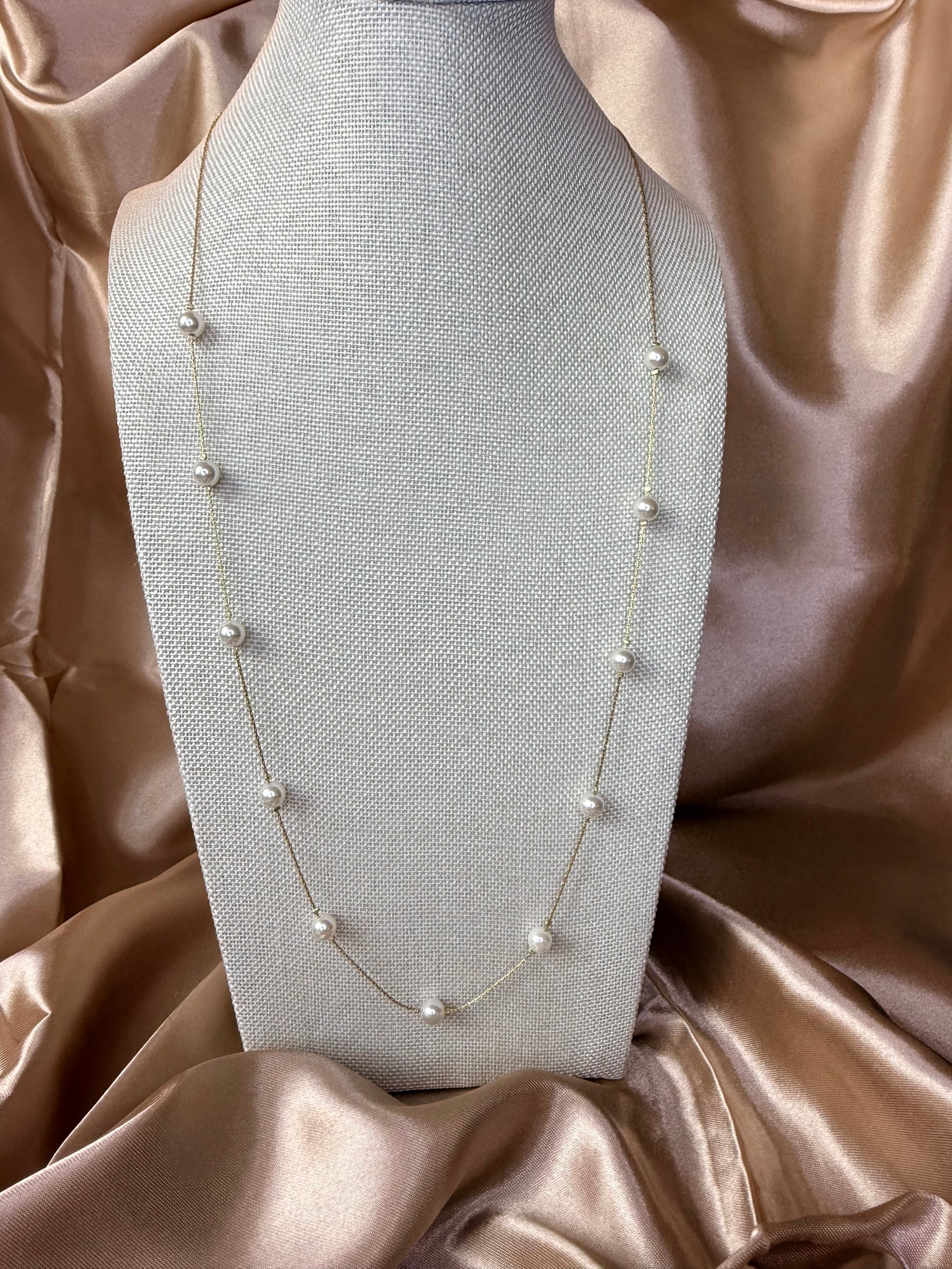 Sautoir en acier inoxydable doré et perles