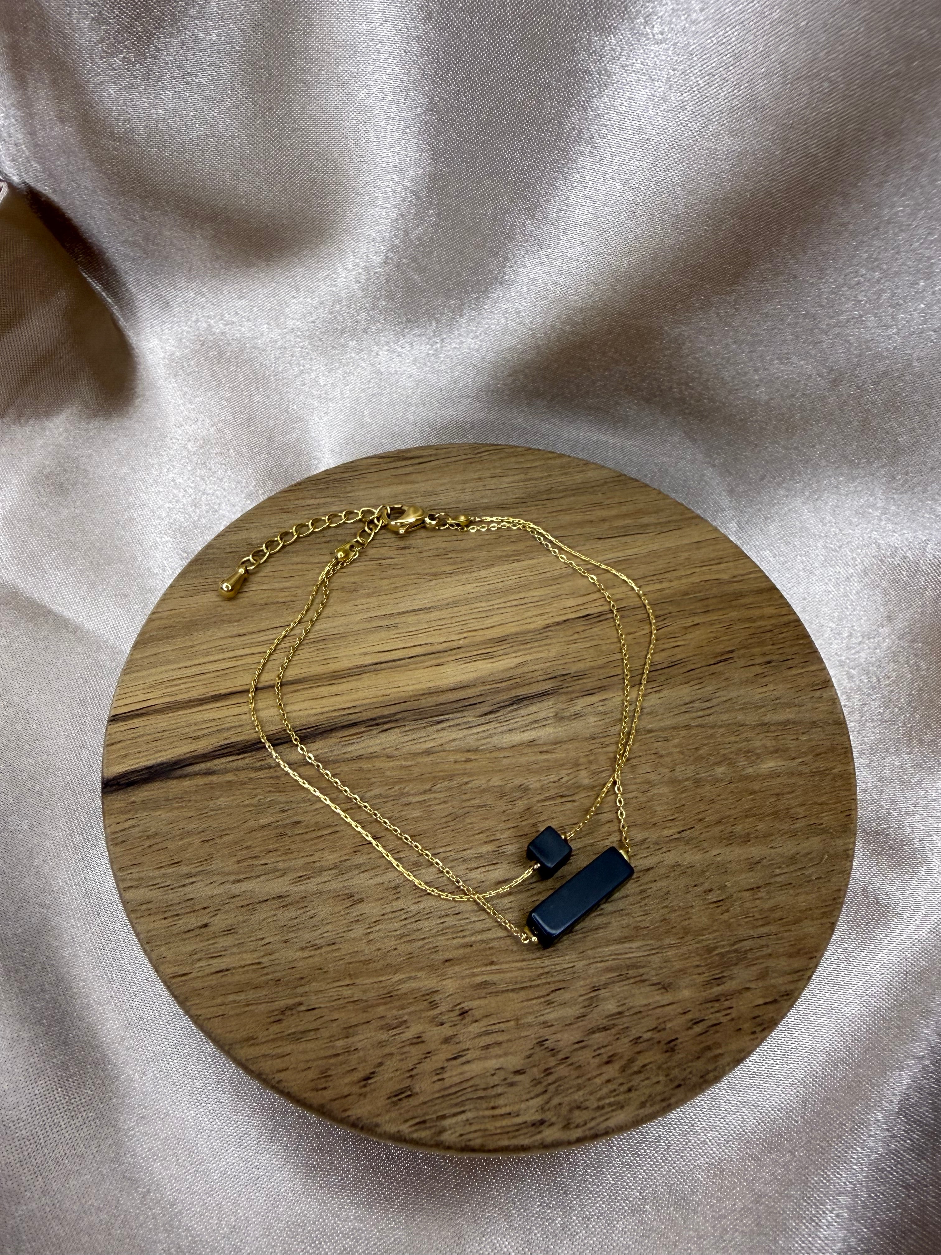 Bracelet acier doré et agate noir