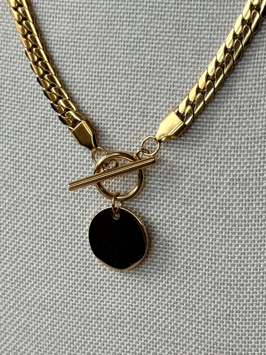 Collier à mailles plates en acier inoxydable doré