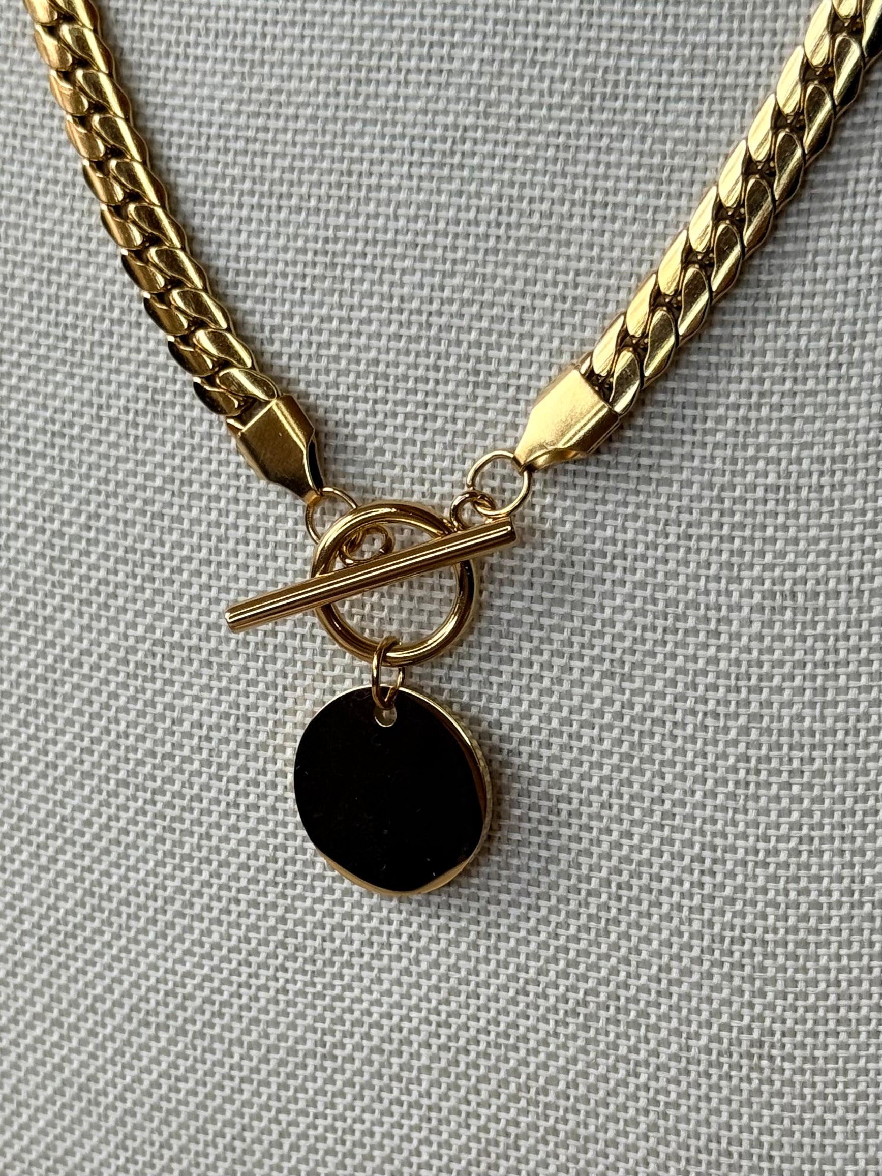 Collier à mailles plates en acier inoxydable doré